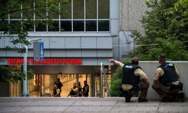 MUNICH, GERMANY - JULY 22:  Police officers respond to a shooting at the Olympia Einkaufzentrum (OEZ) at July 22, 2016 in Munich, Germany.  According to reports, several people have been killed and an unknown number injured in a shooting at a shopping centre in the north-western Moosach district in Munich. Police are hunting the attacker or attackers who are thought to be still at large. (Photo by Joerg Koch/Getty Images)